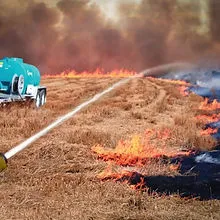 The Blaze Terminator autonomously spraying a grass fire